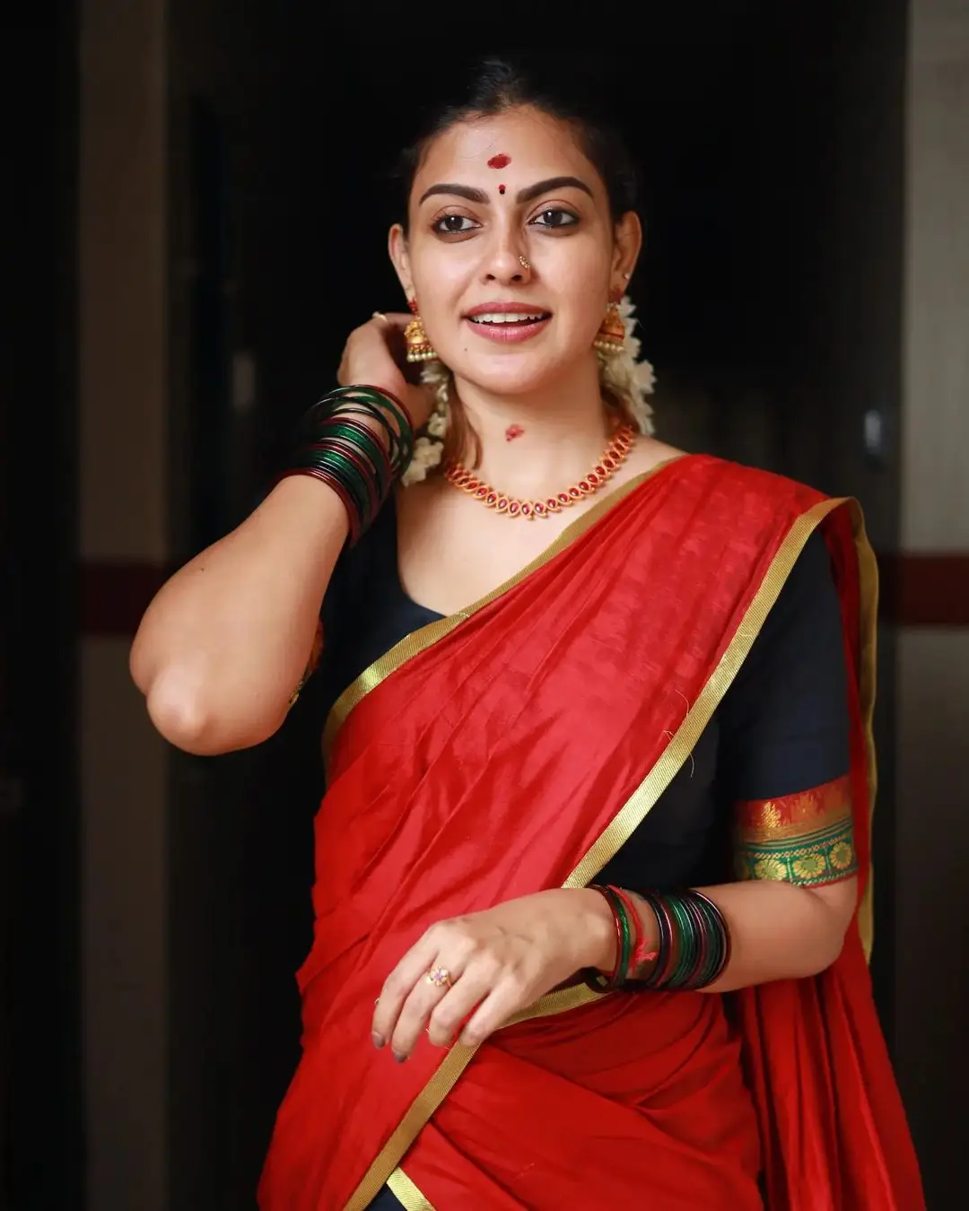 Indian Actress Anusree Nair in Red Color Saree Blouse